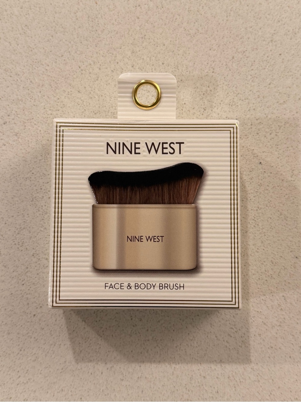 Nine West Face & Body Brush in Gold and Black